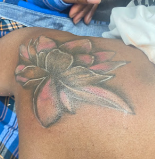 Lotus flower shoulder tattoo